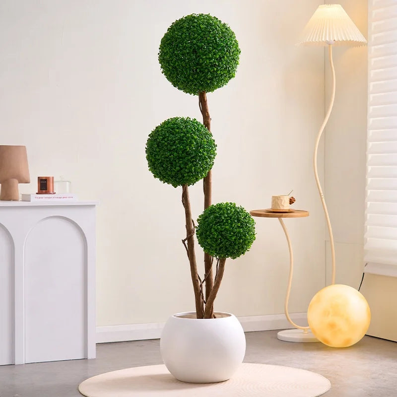 Plante artificielle sur pied vert et marron plastique